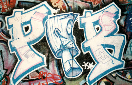 graffiti with a smiling piston